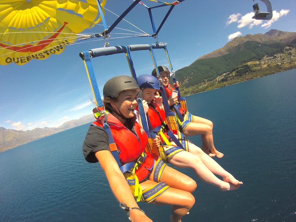 Flying high in the sky while parasailing 