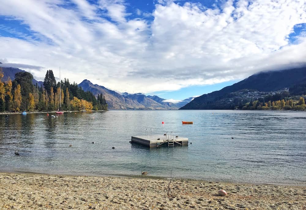 Your family can jump off the pontoon at the lake in Queenstown