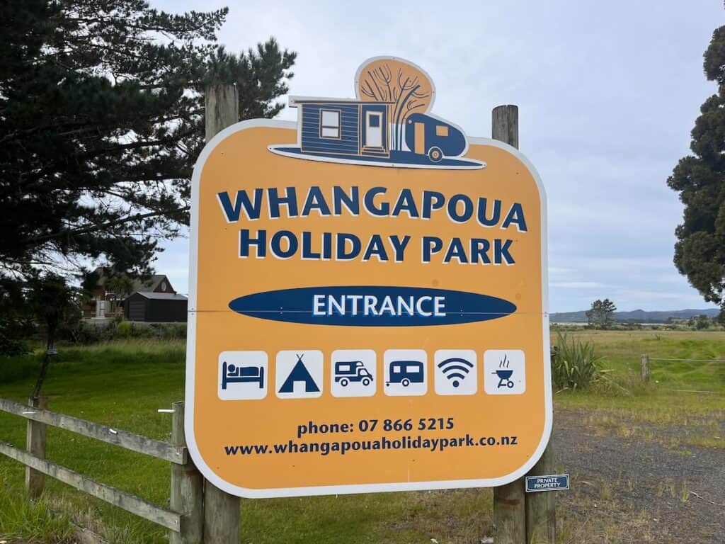 The Whangapoua Beach Holiday Park sign 