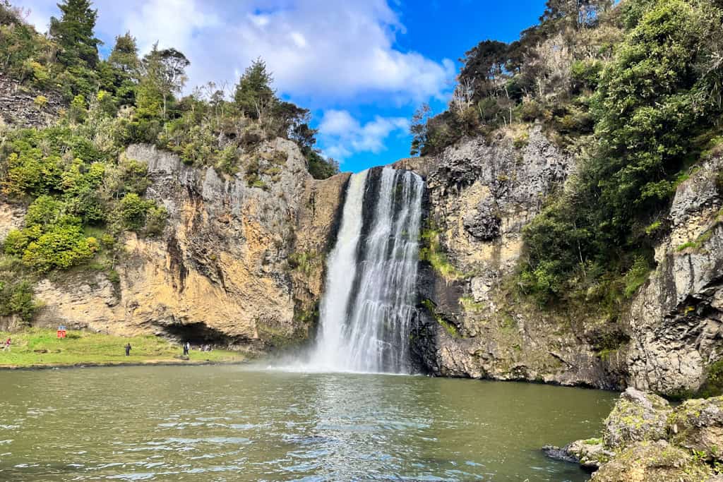 View of water Hunua Falls over the pool at the bottom of the Auckland waterfall.