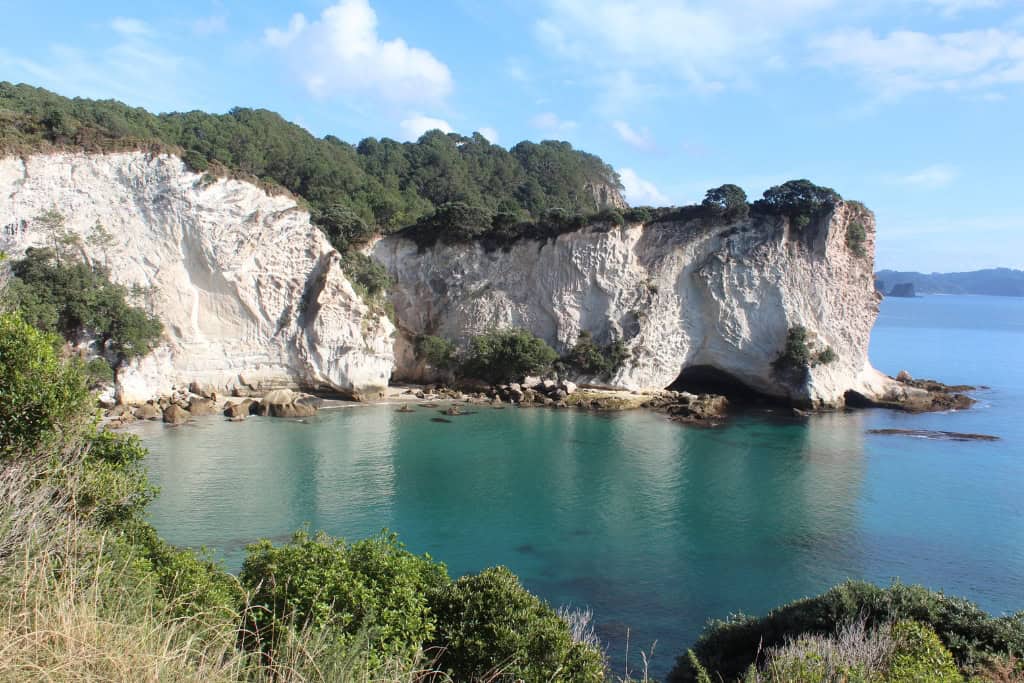 White cliffs tower over the beach at Stingray Bay.