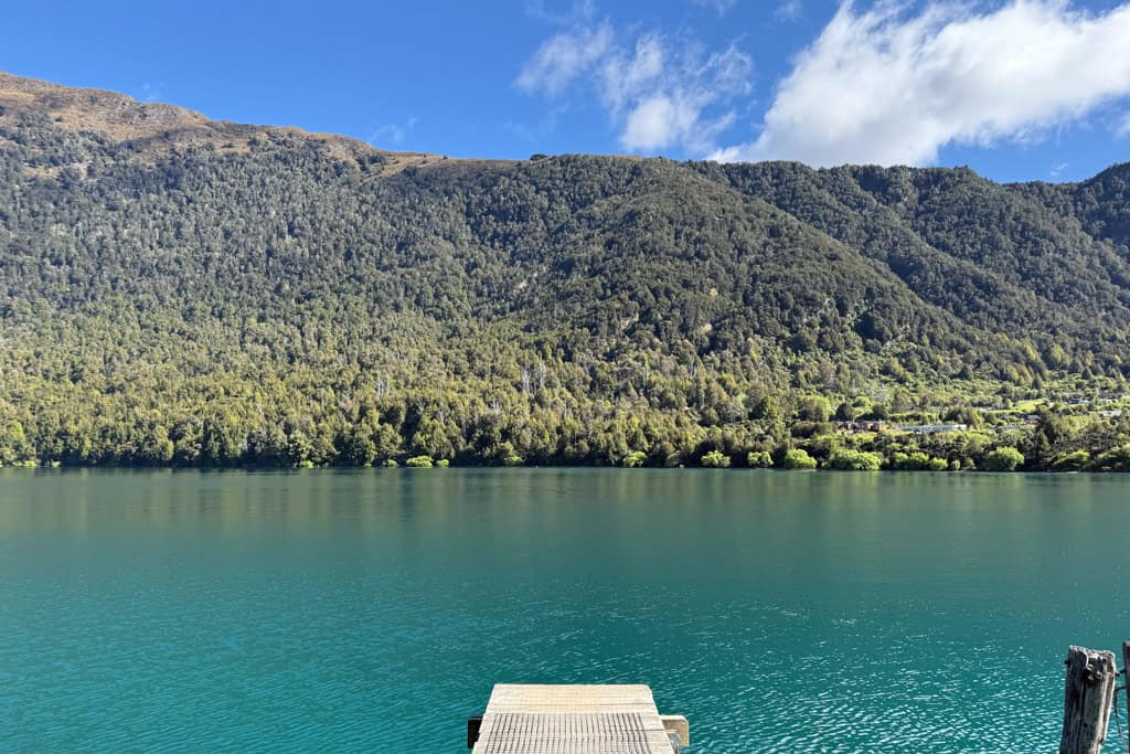 The blue water at the end of the Bobs Cove jetty glistening in the sun.